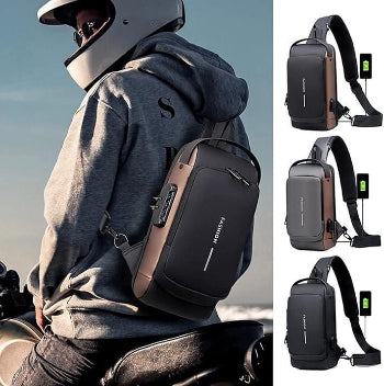 Person wearing a black crossbody bag with USB charging port, sitting on a motorcycle.